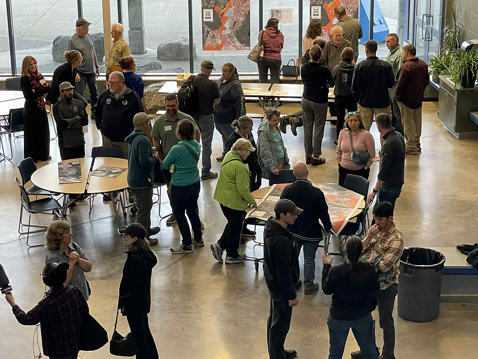 After the presentation and question-and-answer session, Juneau residents talked with community representatives on Wednesday, July 30, 2025. (Laurie Craig / Juneau Independent)