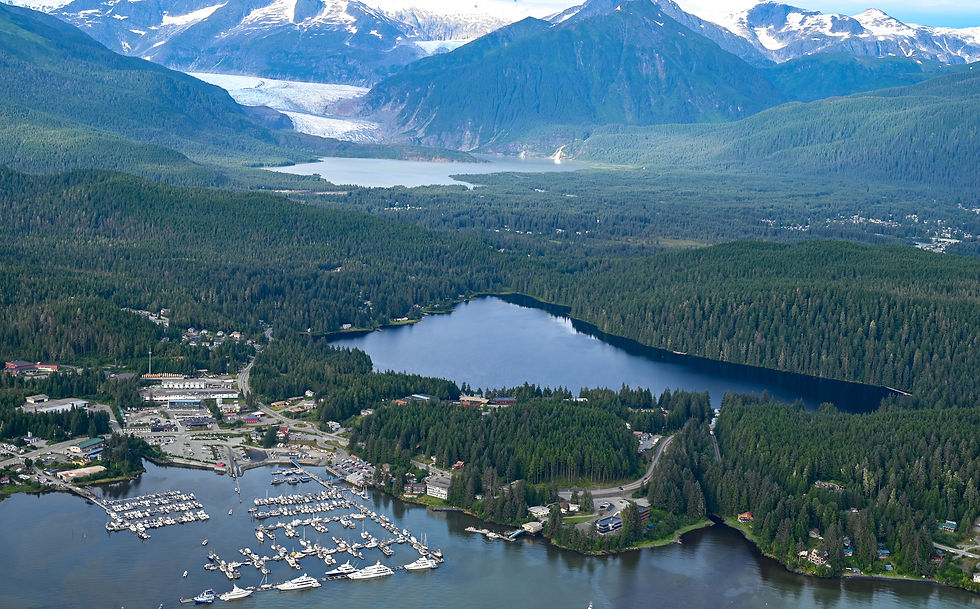 The Mendenhall Glacier and Mendenhall Lake are seen during a helicopter ride on Aug. 13, 2025 – the day the Mendenhall River reached a record flood crest of 16.65 feet. (Jasz Garrett / Juneau Independent)