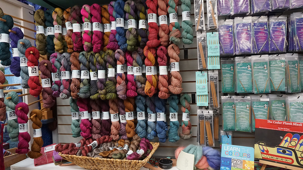 Hand dyed yarns hang at Changing Tides downtown on Tuesday, July 29, 2025. (Ellie Ruel / Juneau Independent)