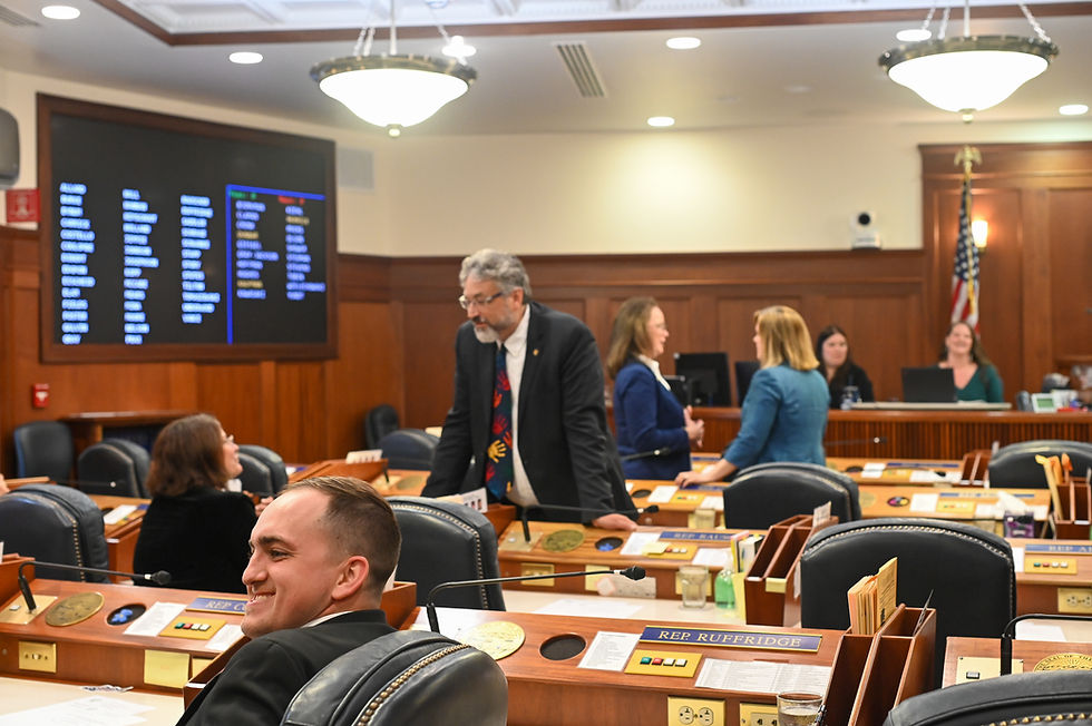 Representatives chat while waiting for the opening special legislative session to begin on Saturday, Aug. 2, 2025. (Jasz Garrett / Juneau Independent)