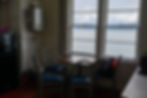 The kitchen of Eldred Rock Lighthouse offers a view of the ocean and mountains on Saturday, May 30, 2026. (Jasz Garrett / Juneau Independent)