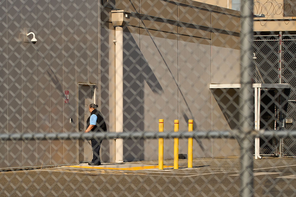 A GEO Group employee enters a building at the Northwest ICE Processing Center, Wednesday, Aug. 13, 2025, in Tacoma, Wash. (AP Photo / Lindsey Wasson)