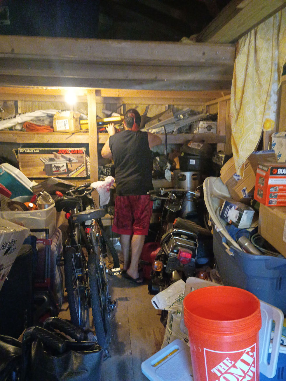Charlie up and going through the tool shed to find things so he can start to stock wood for the house.