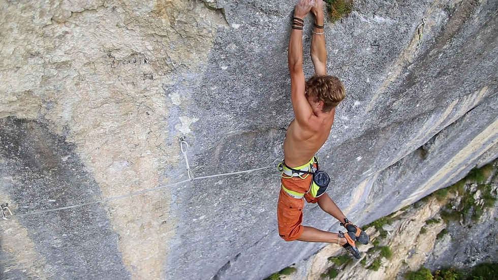 man-rock-climbing-outdoors-on-sunny-day-2026-09-16-16-25-10-utc.mov