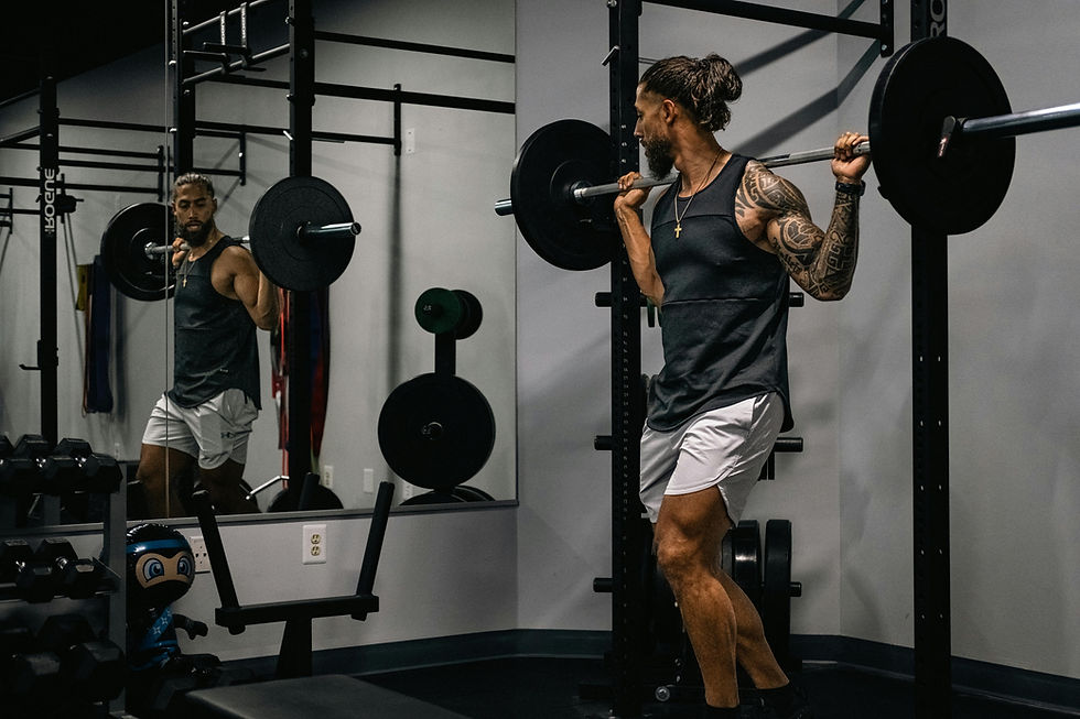 Man preparing to barbell back squat