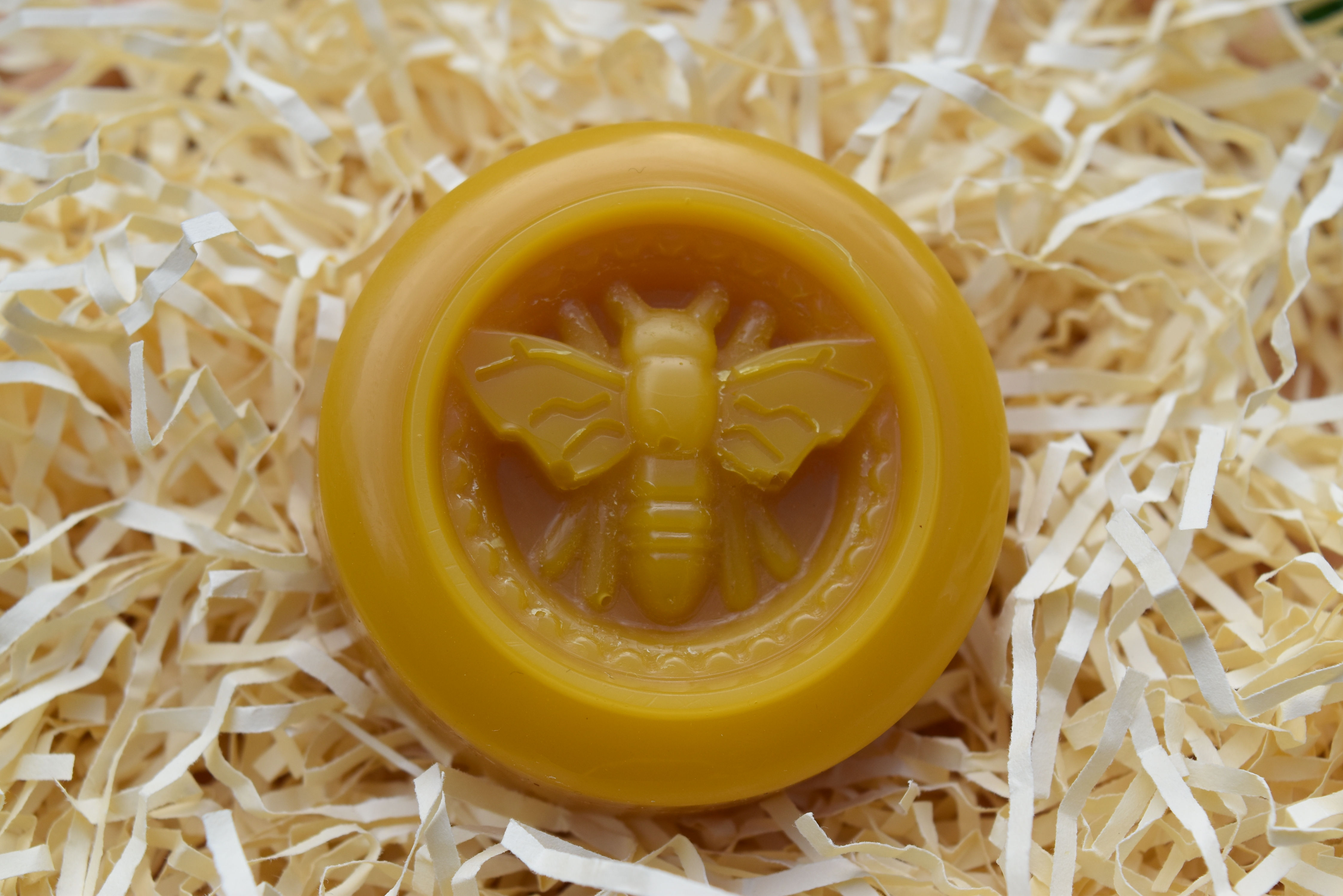 Beeswax disk with bee decoration in organza bag