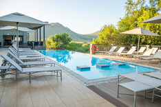 Lodge exterior photography swimming pool Shepherd's Tree Lodge