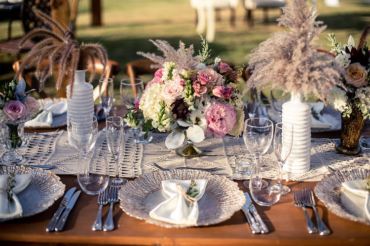 WeddingInspiration_FreeSpirit_Reception_PinkFlowers hard rock.jpg