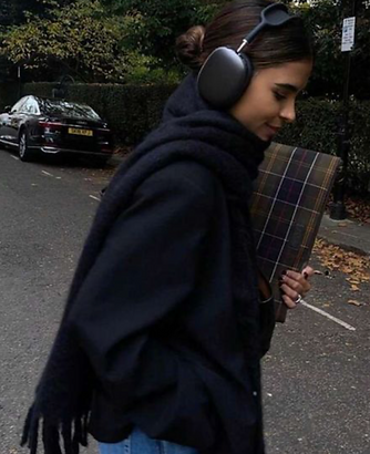 girl in street headphones on