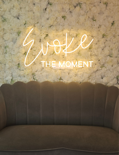 Image of The “Evoke the Moment” selfie wall—more than a photo spot—it’s a celebration of the people who make this place special. So when you drop by, take a moment to pause, snap a photo, and remember that sometimes, the most beautiful moments aren’t planned at all.