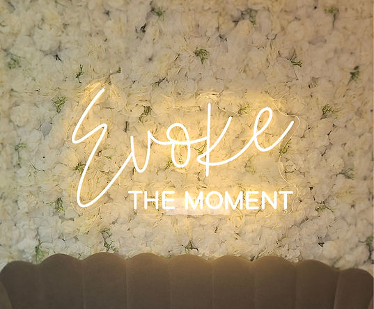 Floral wall of Evoke Studio & Gifts used for selfies - designed by Melissa Mitchell Art