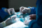 surgeons-performing-operation-in-operation-room.jpg