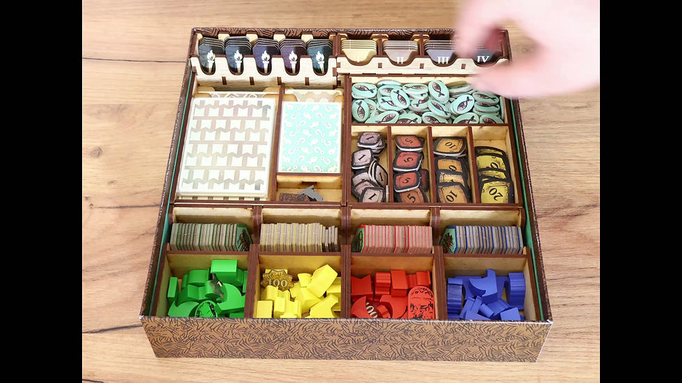 Thumbnail: Feya's Swamp components organized in the game box.