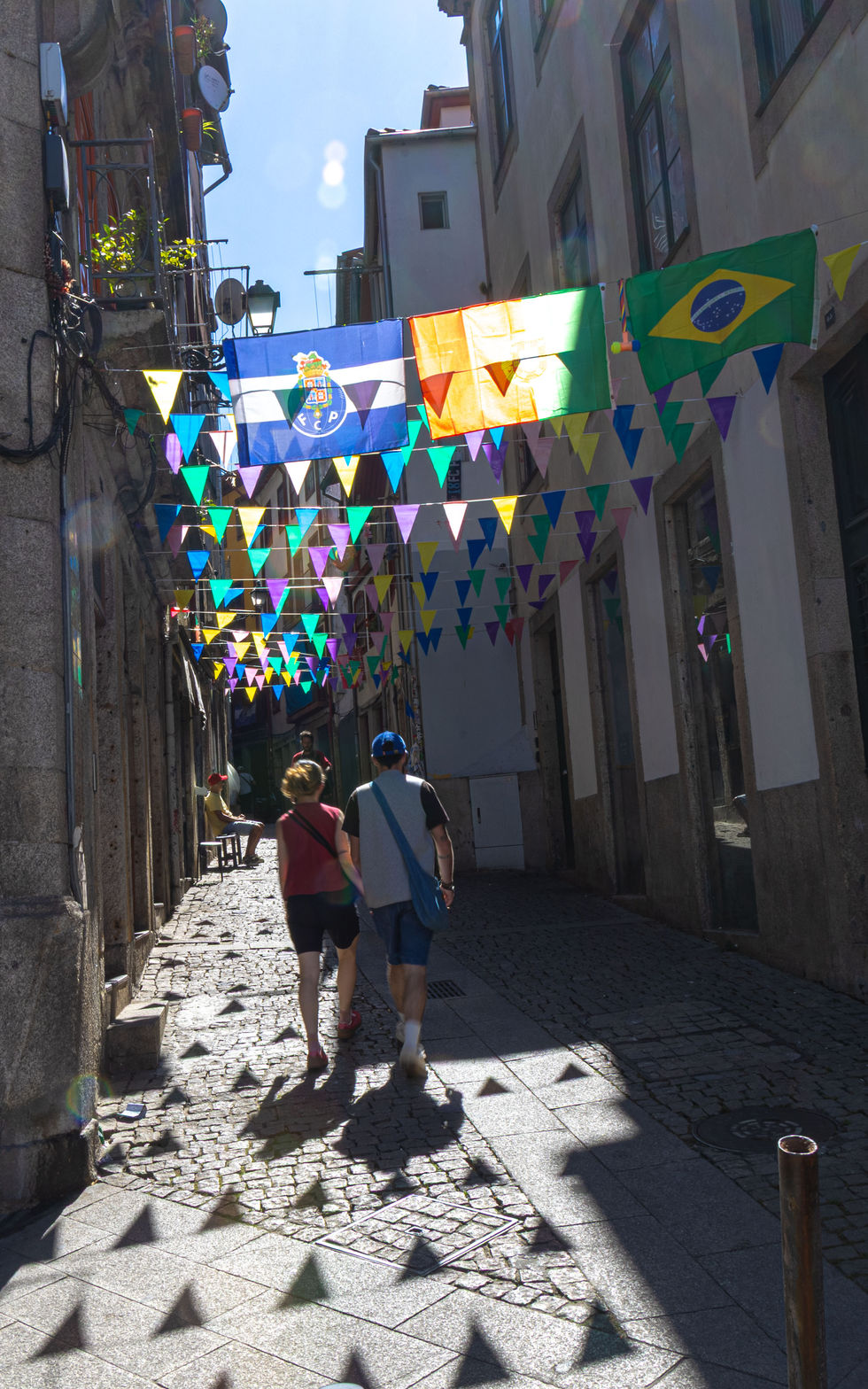 Couple on small street in Porto