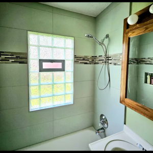 Custom spa bath remodel including Italian tile, handmade subway tile, expanded niche, venetian bronze shower fixtures
