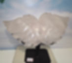 Englevinger i rosenkvarts plassert på soverommet for god energi