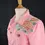 Miniature : Veste rose au perroquet