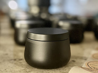 Candle in black tin