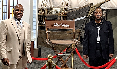 Bill and Malick at director's chair.png