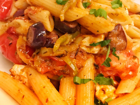 Pasta with sautéed Greek Salad ingredients