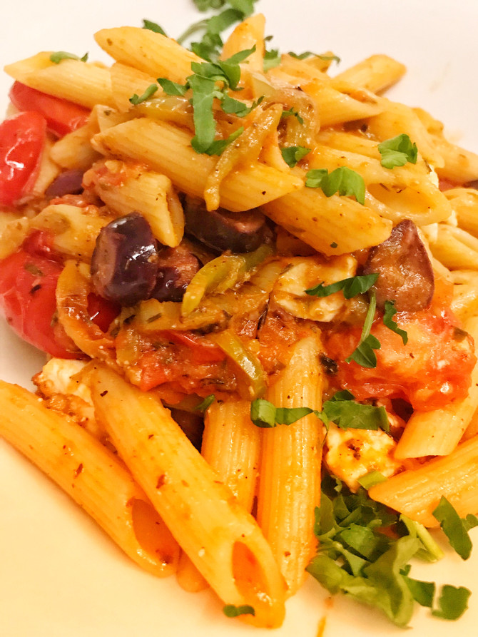 Pasta with sautéed Greek Salad ingredients