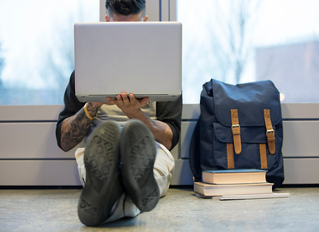 Student studying in hallway