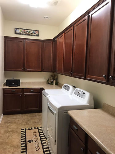 New uppers cabinets in a laundry room in Verado, Buckeye, Arizona
