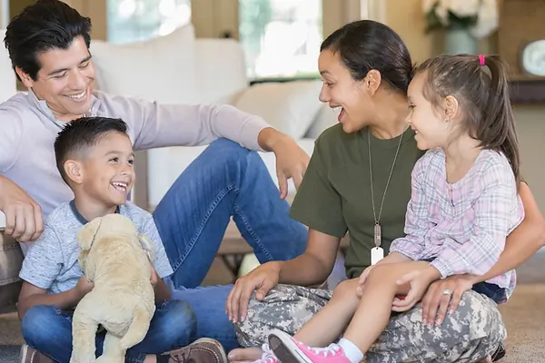 Military mom with husband and two kids.webp
