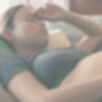 Women suffering with pregnancy symptoms