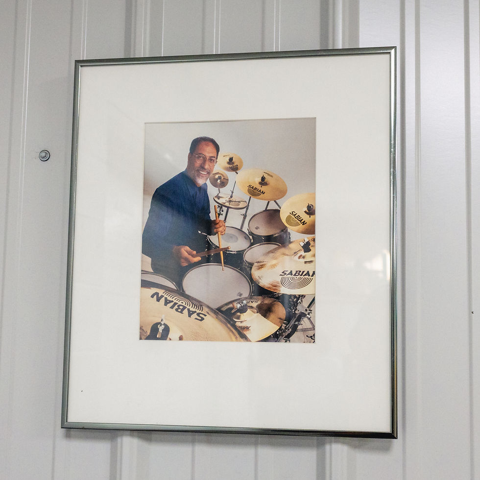 Portrait of drummer and educator Dom Famularo displayed at the Sabian factory.
