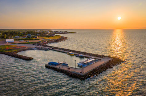 Aerial view of the wharf in Bas Cap-Pelé, New Brunswick at sunset.
