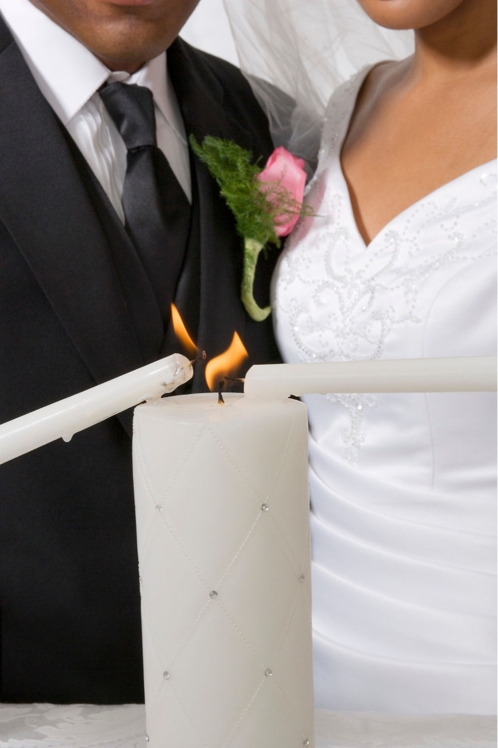 a couple lights a unity candle