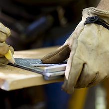 Carpenter Measuring Wood_edited.jpg