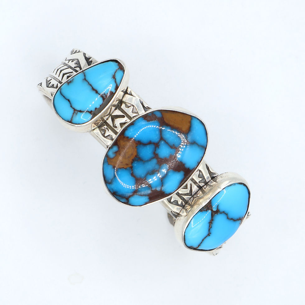 Handmade sterling silver and authentic turquoise hand-stamped 3 stone cuff bracelet by Native silversmith Jacob Troncosa.