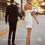Thumbnail: Groom and Back of Bride in Cailin Elegant Short Wedding Dress