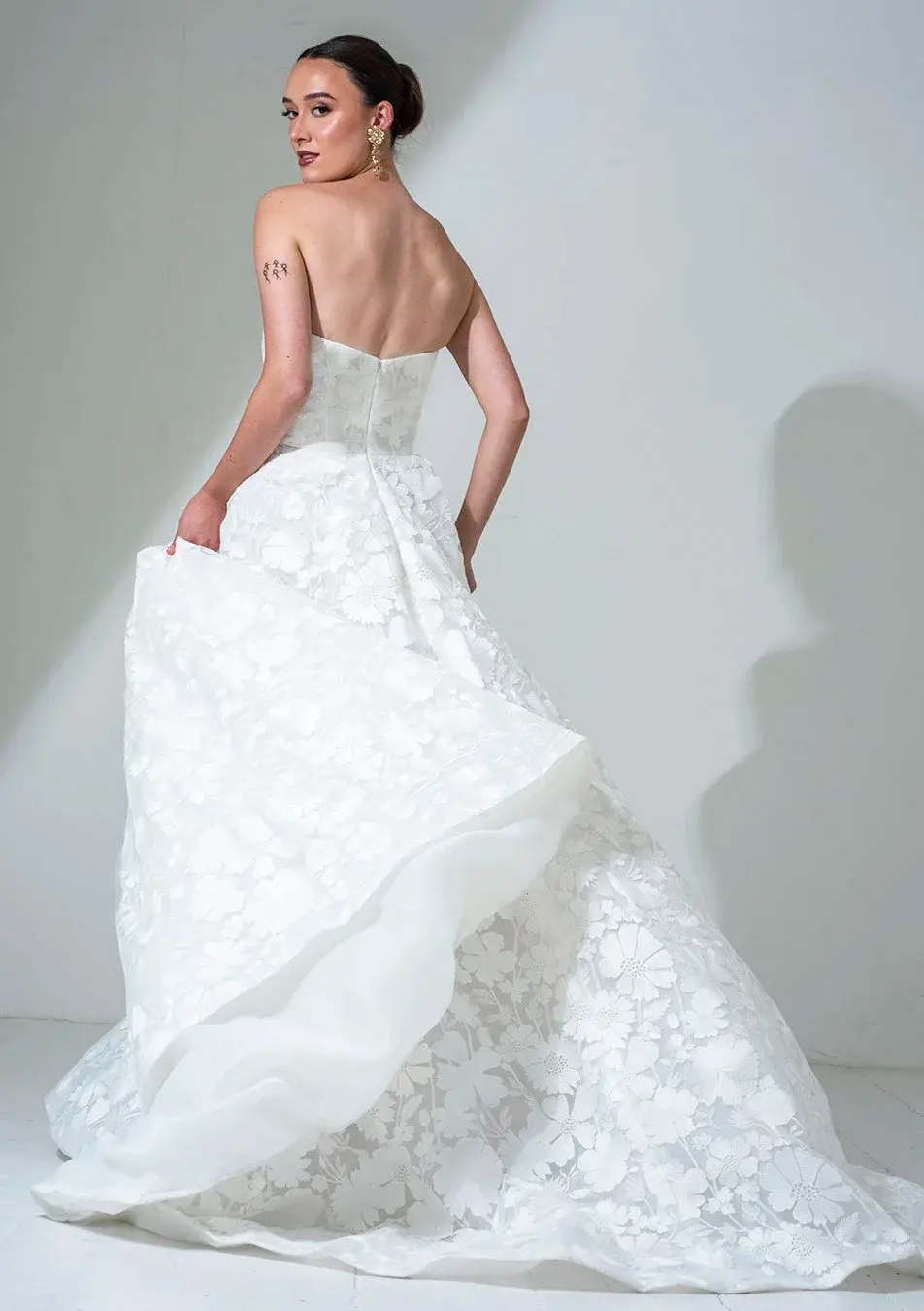 Thumbnail: Back of Contemporary Lace A-Line Wedding Dress by Freda Bennet