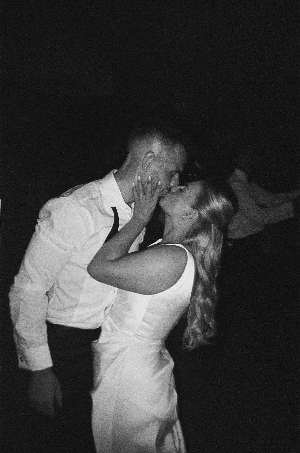 bride and groom kissing