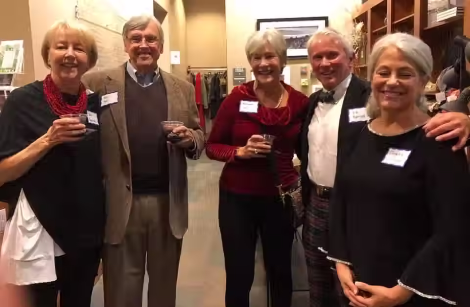 A group of people giving out their best smiles.