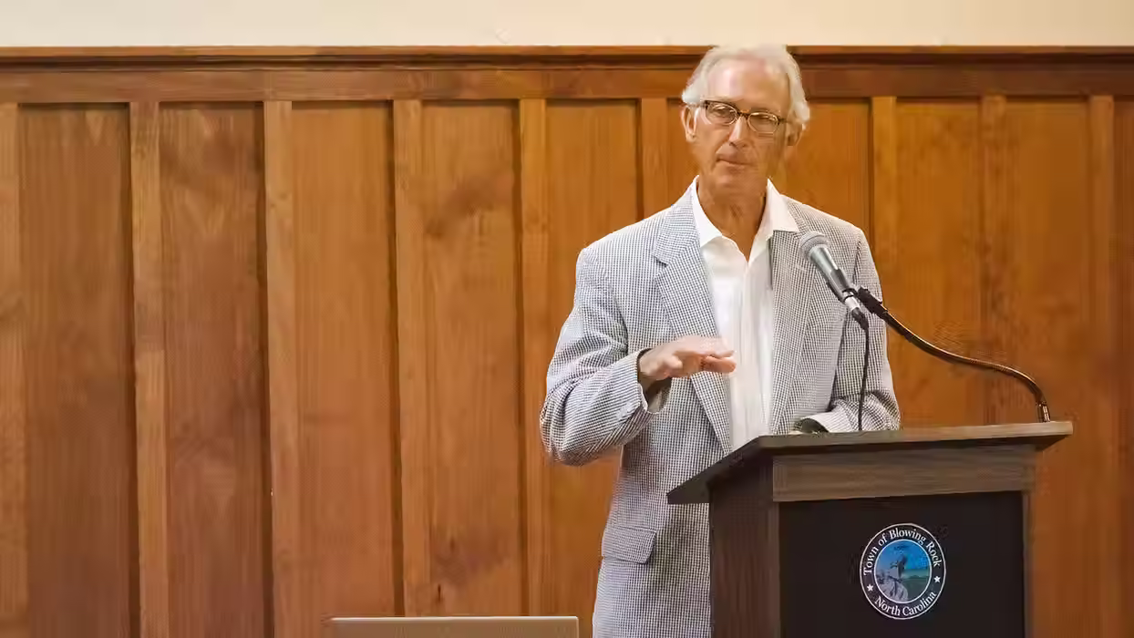 An old man giving his opening remarks