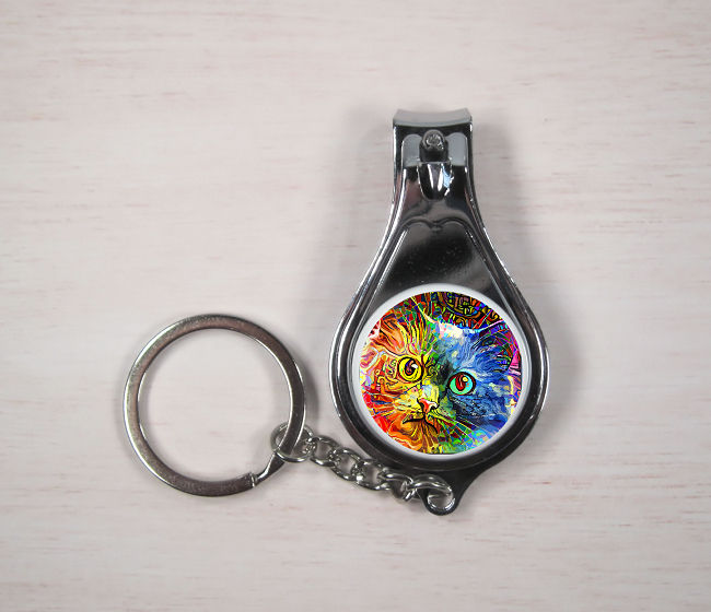 Kaleidoscope cat keyring with nail clippers and bottle opener
