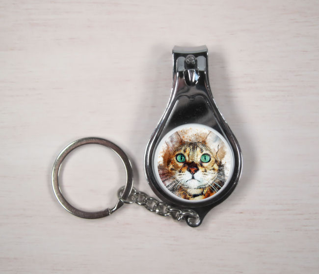 Ginger tabby cat keyring with nail clippers and bottle opener