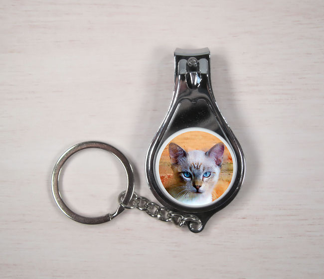 Sugar cat keyring with nail clippers and bottle opener