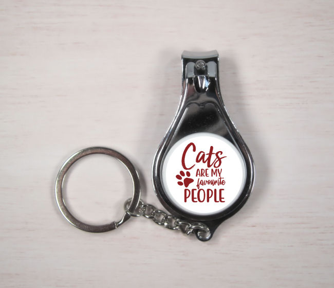 Our Cats Are My Favourite People multipurpose keyring which also has nail clippers and a bottle opener