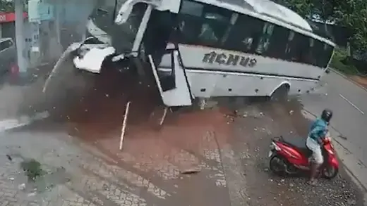 Bus carrying 35 wedding guests veers off the road and crashes into a gas station