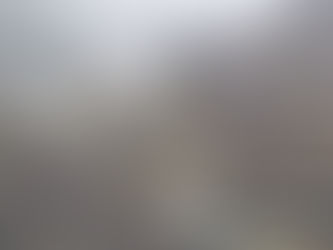 A stream has overflowed, blocking the culvert on the Pogradec–Qafë Thanë road