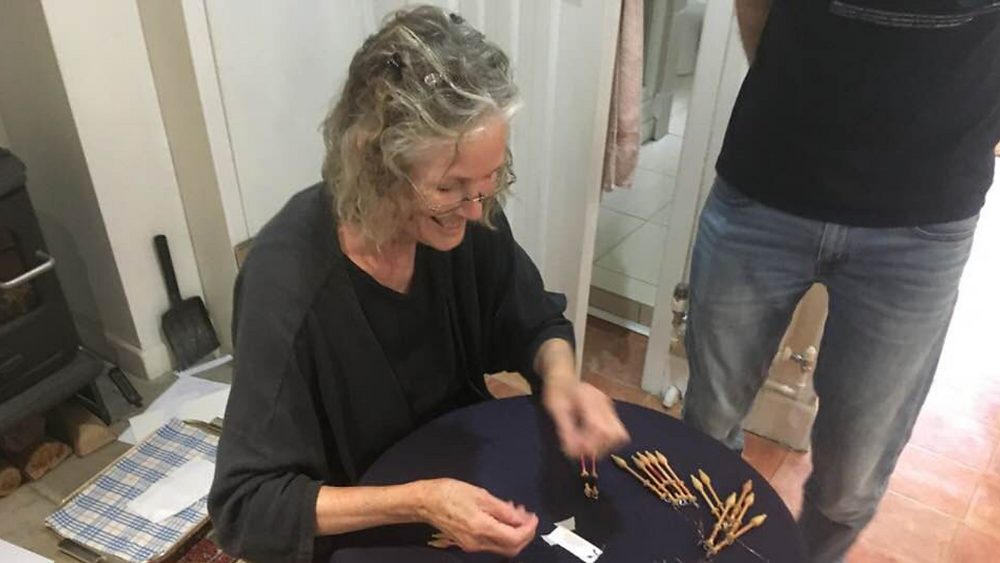 Lauran Sundin teaching us about "bobbin ballet" at Lace Camp. Photo by Cheri Dunnigan