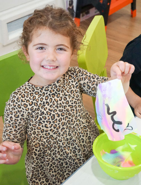 girl painting at Full Day Preschool Near Me