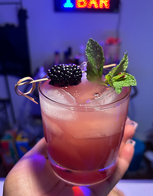 Blackberry-bourbon drink made by Markayla—the mix maven