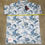 Thumbnail: Travis Mathew Featherweight Island Polo SIZE XXL White Blue Print 00143-MP-PO-B2