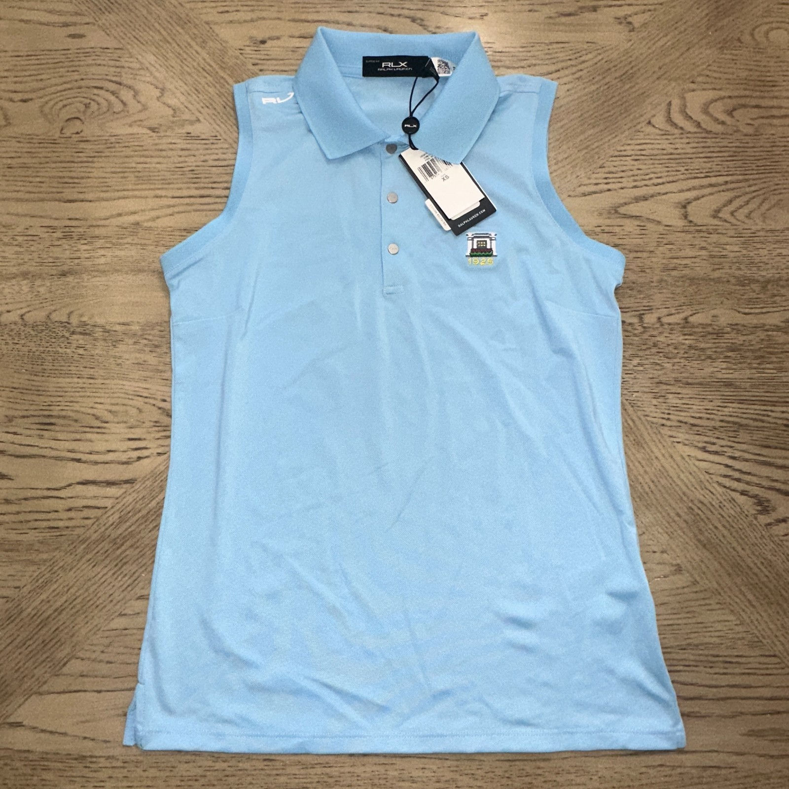 Polo RLX Sleeveless Solid Pique Polo Blue SIZE XS 947-V